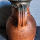 Pitcher traditional pottery Folk art in old enamelled sandstone