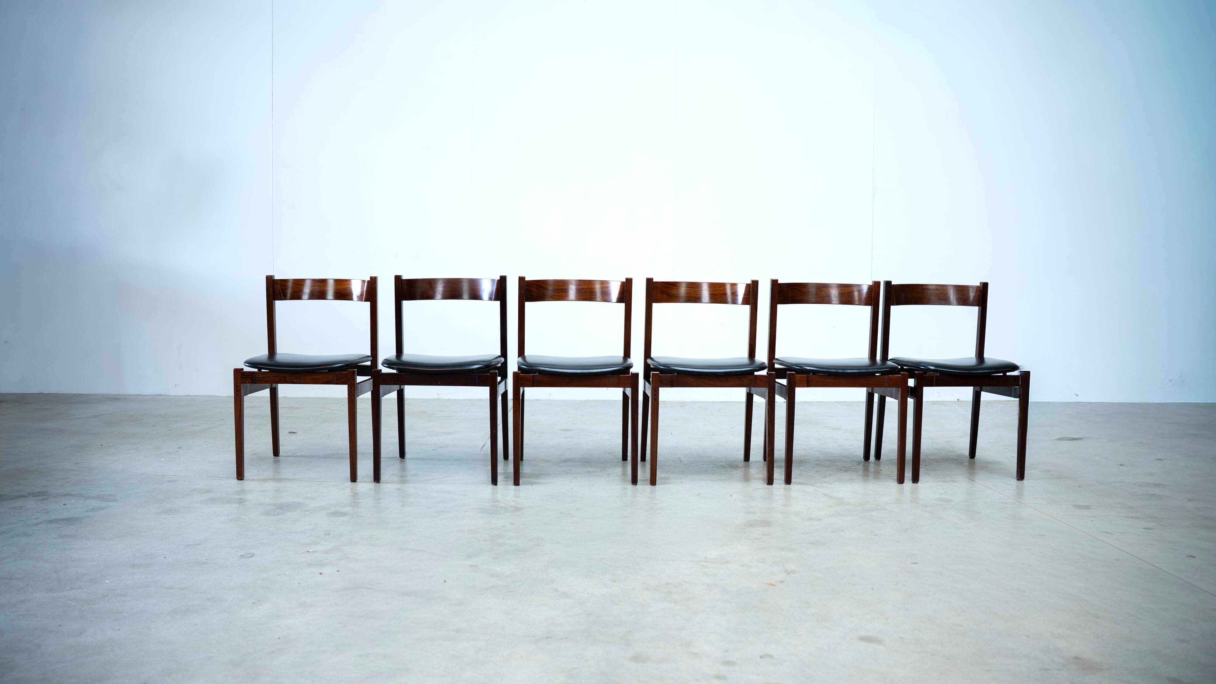 Set of six model 101 rosewood dining chairs by Gianfranco Frattini