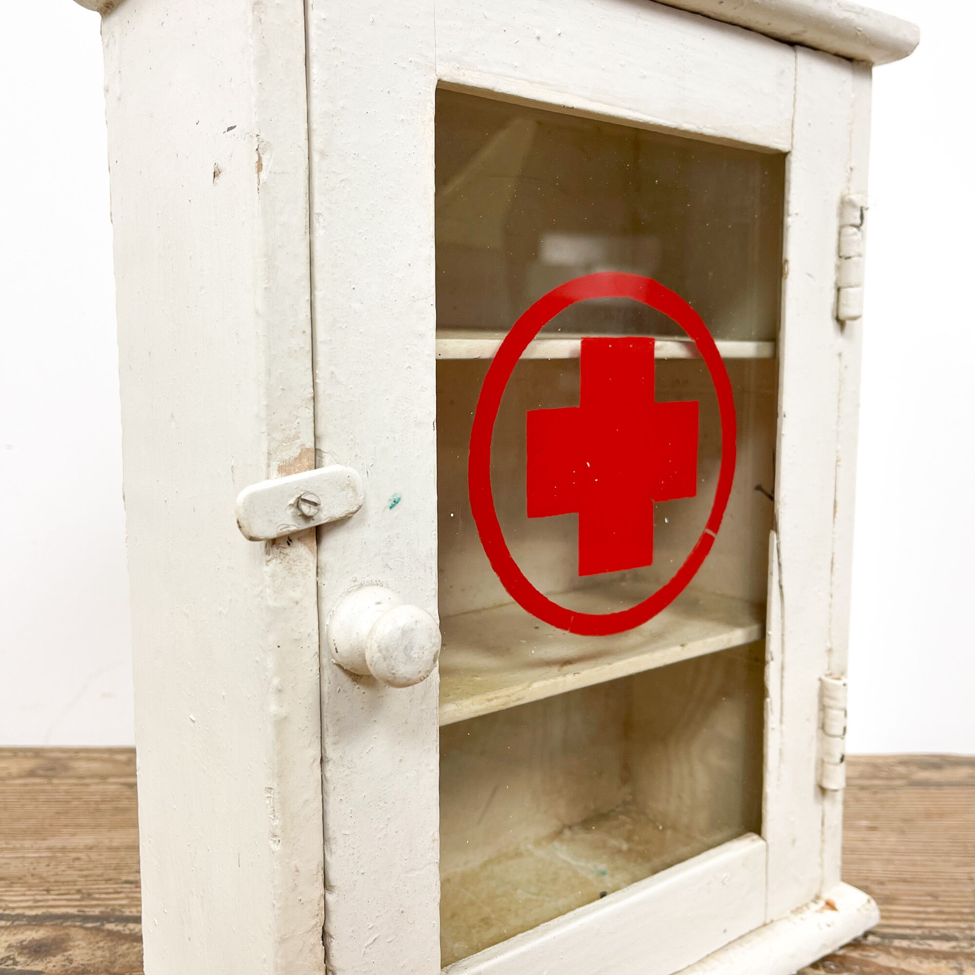 Vintage medicine cabinet red cross glass door