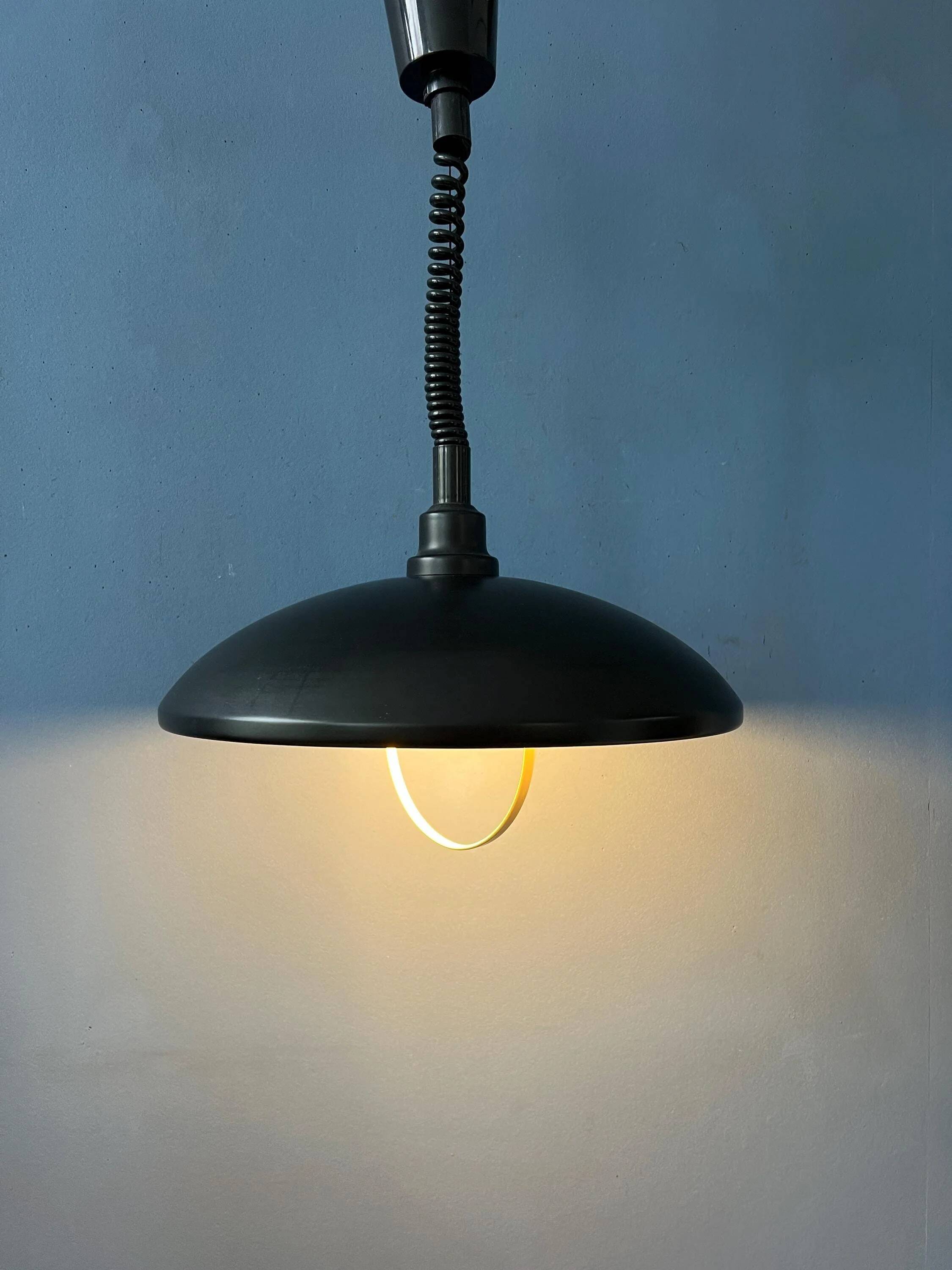 Black oval metal pendant Mid-Century