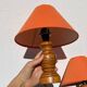 Pair of orange turned wood lamps