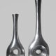Ensemble de vases hauts en aluminium poli avec découpes circulaires