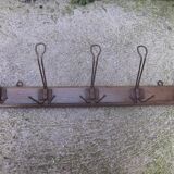 Old coat door has 5 racks