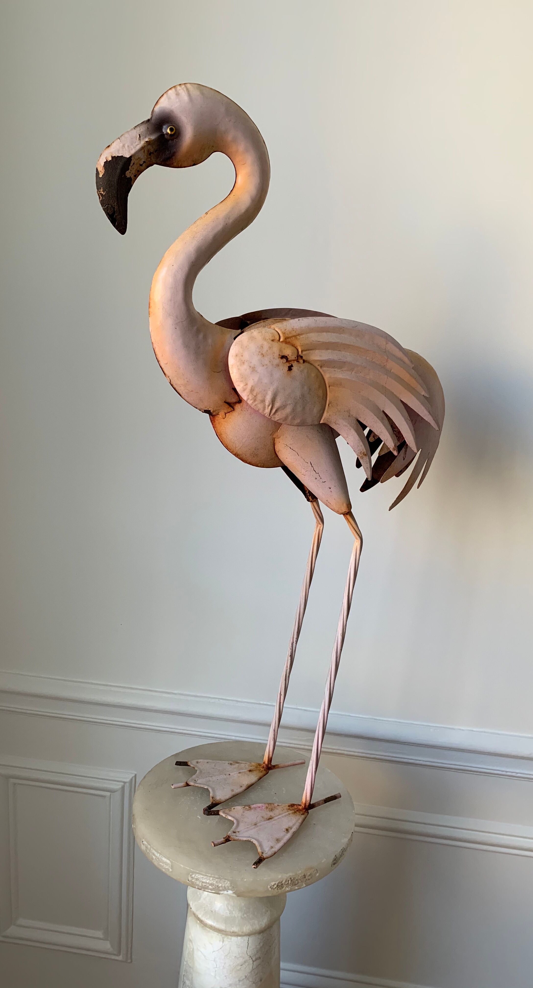 Old decorative pink flame in painted metal