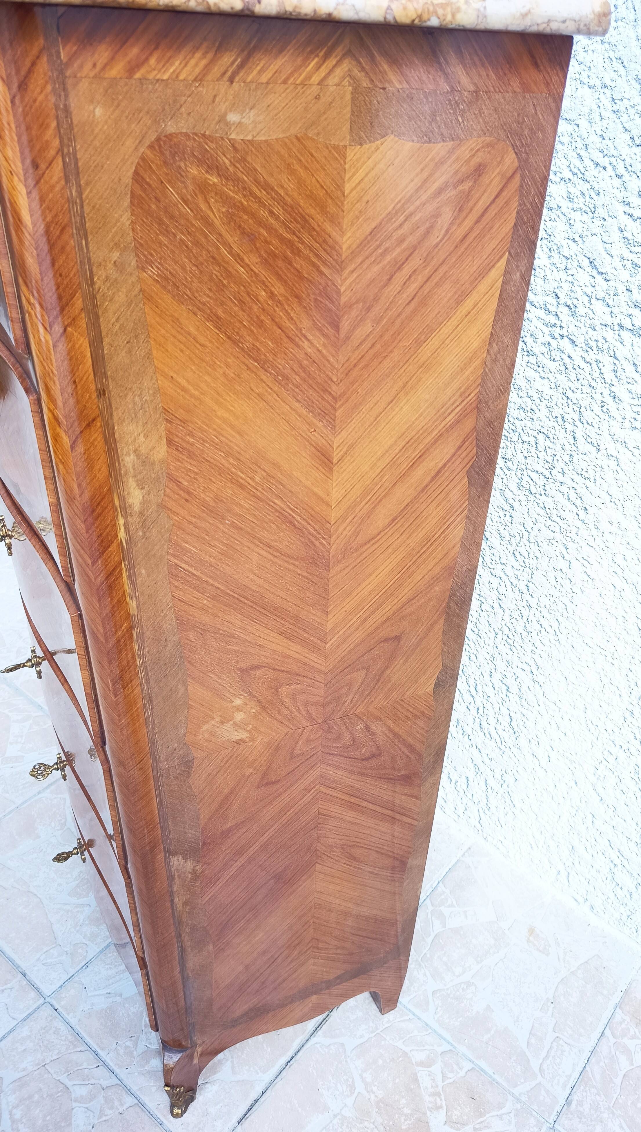Louis XV style chest of drawers in precious wood veneer.