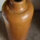 Vintage stoneware liqueur bottle