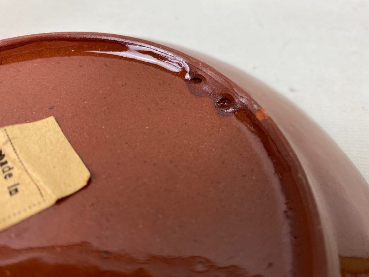 Terracotta teapot and saucer