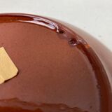 Terracotta teapot and saucer