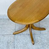 Oval teak coffee table