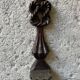 Carved wooden wall candle holder