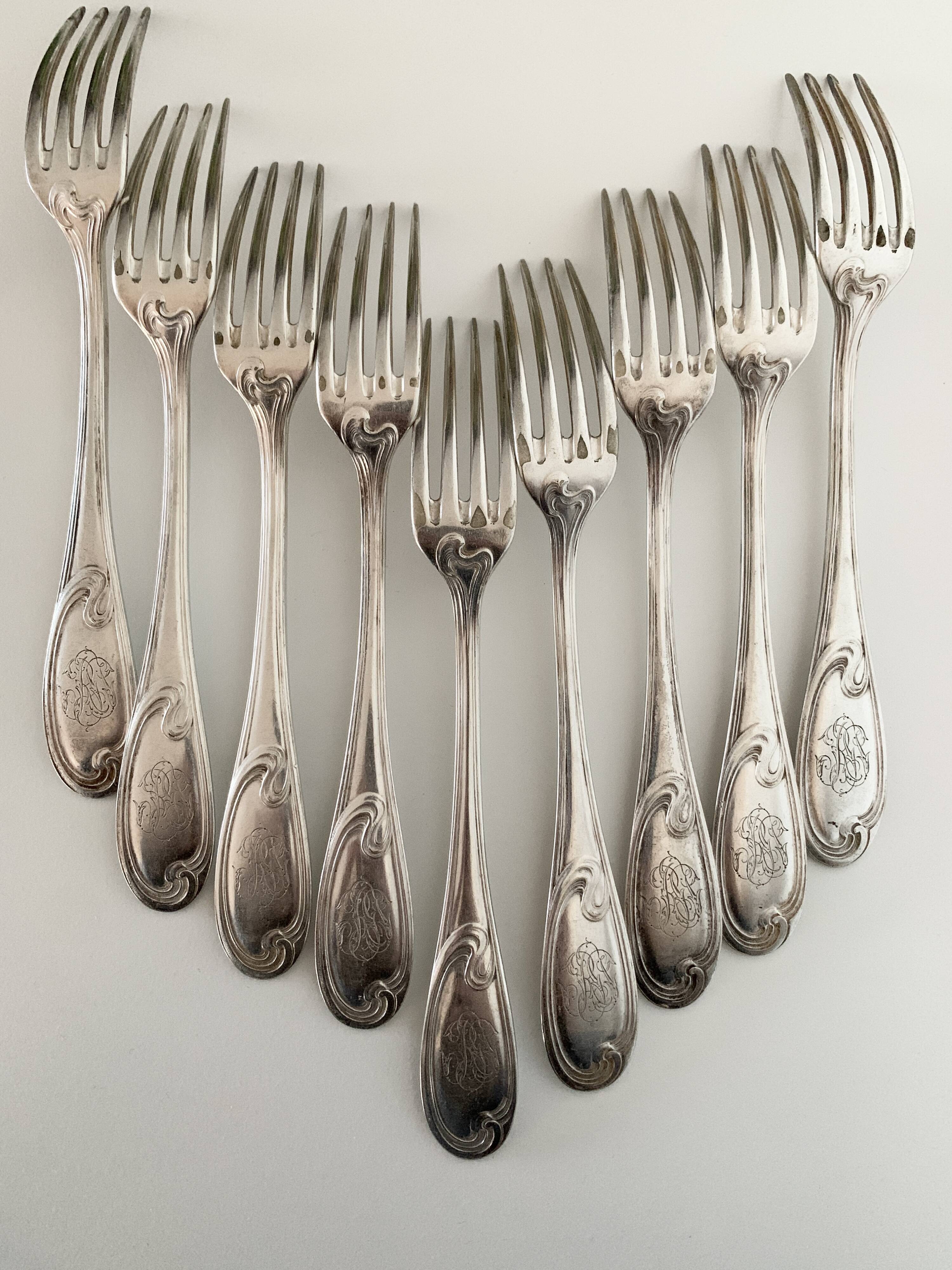 Nine large Ercuis silver-plated forks