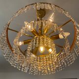 Old brass chandelier and crystal grapevines