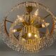 Old brass chandelier and crystal grapevines