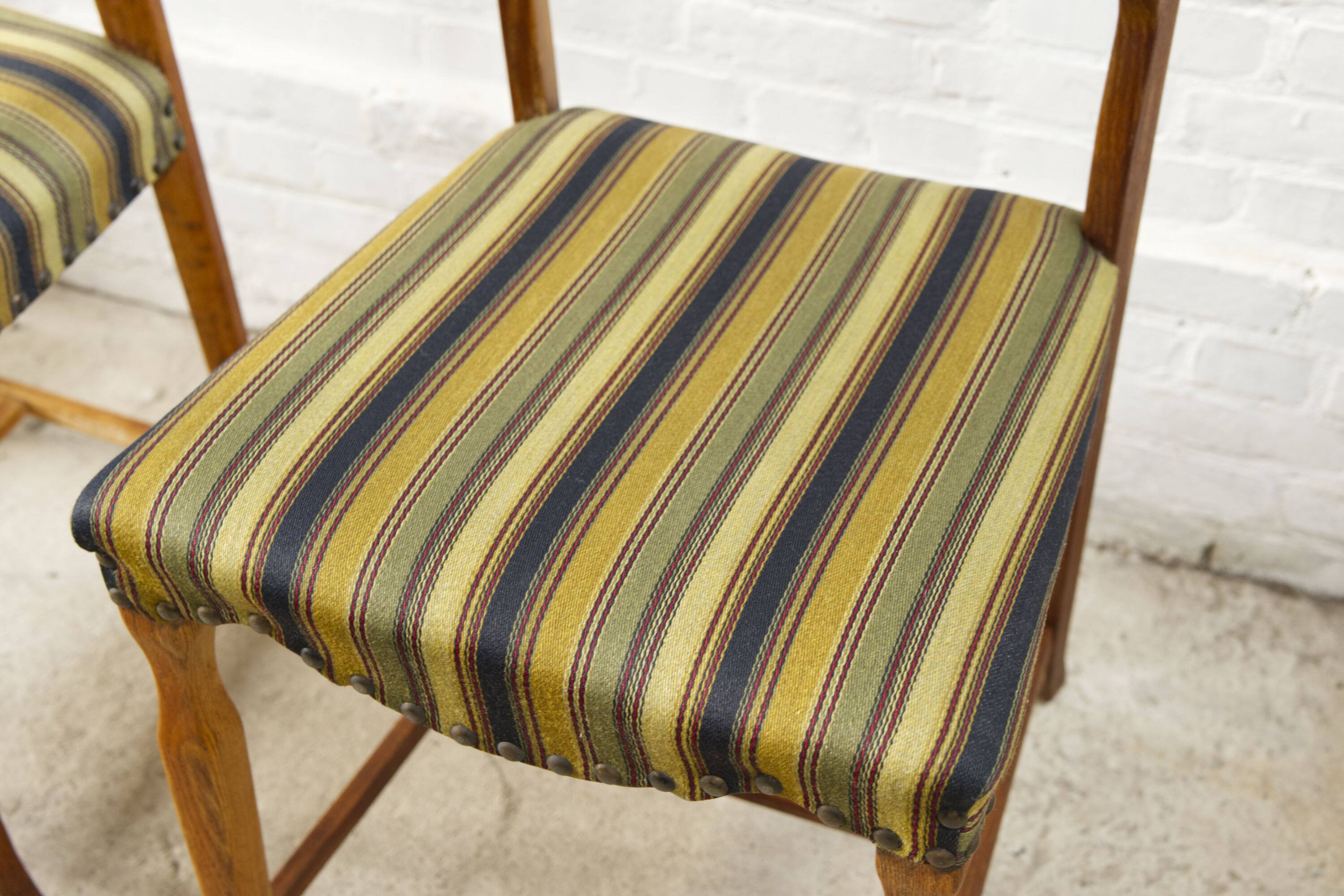 Set of four oak and wool dining room chairs by Henning Kjaernulf, 1960's