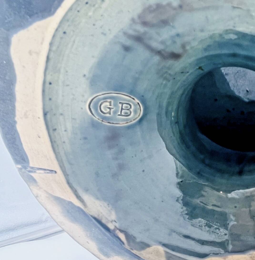 Large footed bowl in green and blue glazed ceramic