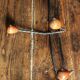 Double wrought iron coat rack with 3 double wooden ball hooks