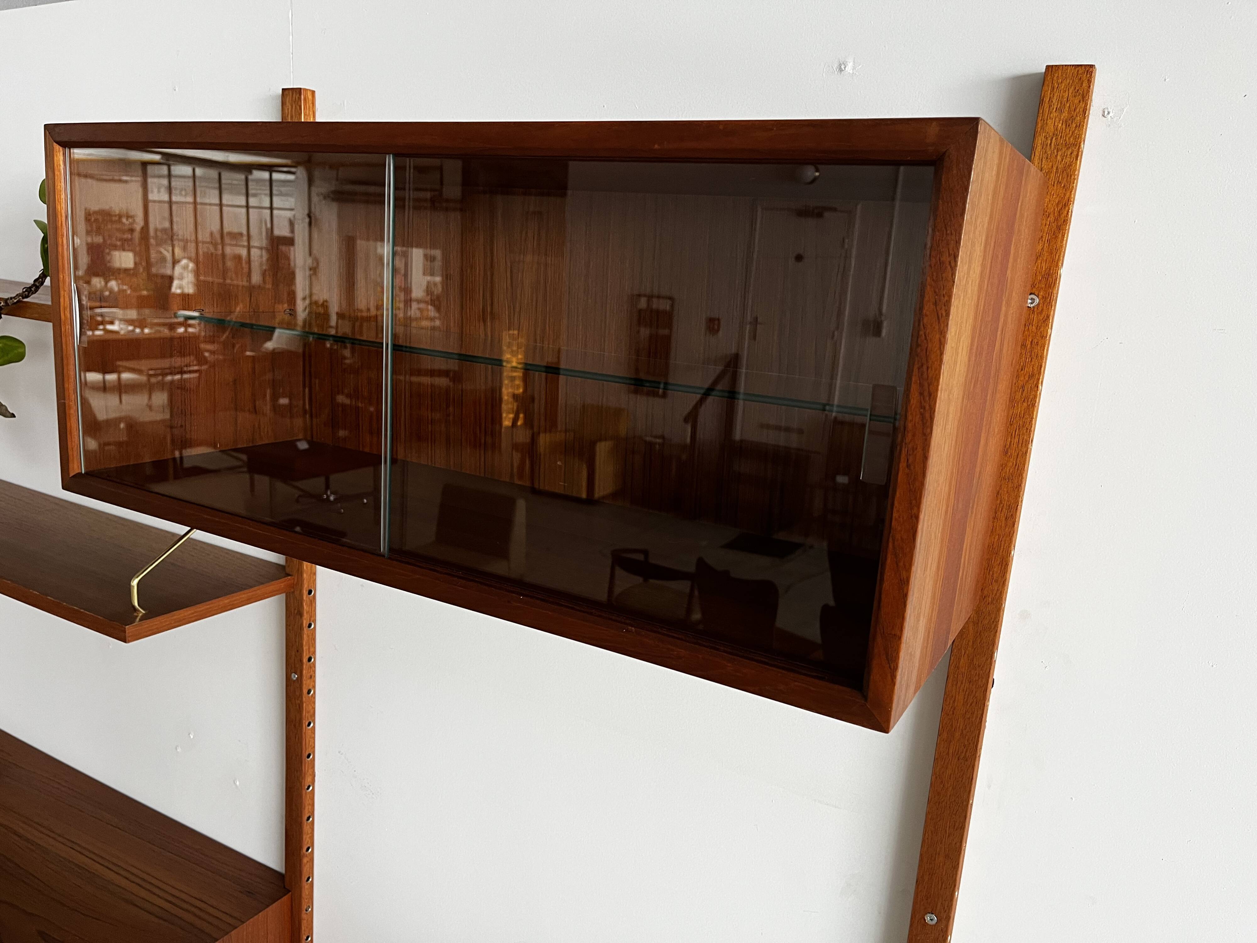 A wall unit with 4 compartments by Poul Cadovius, Denmark, 1960s.
