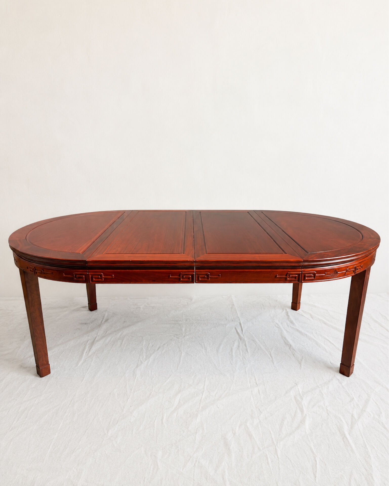 Extendable Chinese dining table in rosewood, 1970s.