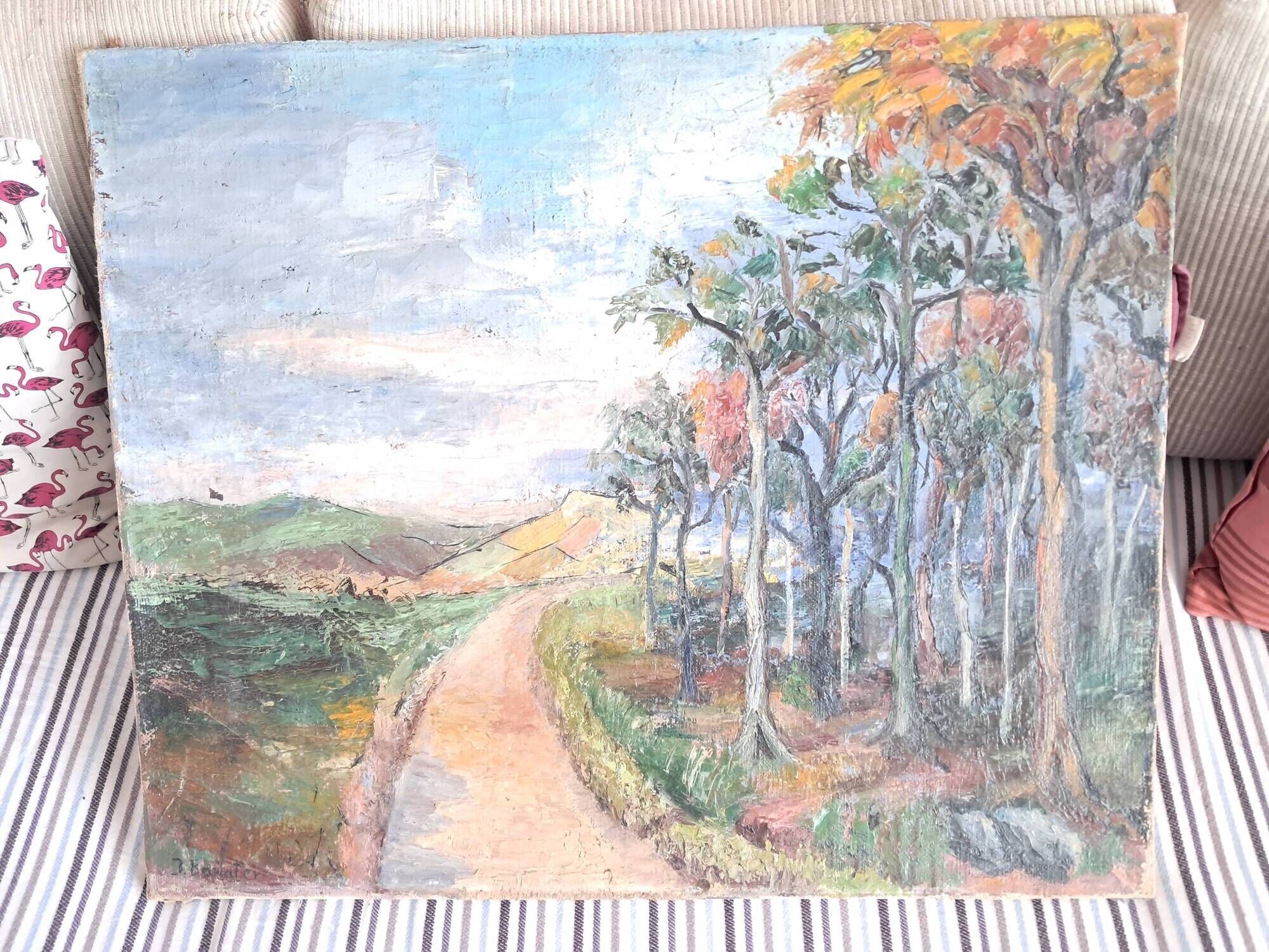Large old oil painting depicting a landscape.