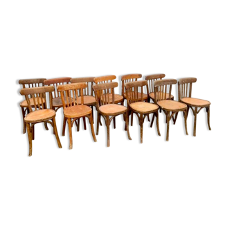 Série de 12 chaises bistrot Baumann bois courbé des années 1930 Patine d'origine