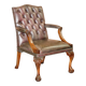 Gainsborough armchair George II leather Chesterfield hand-carved with claw and ball feet.