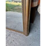 19th century mirror in wood and gilded stucco "scallop shell"