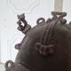 African bronze mask on pedestal, from Ivory Coast, dating