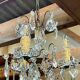 Three-light chandelier in bronze and cut crystal, early 20th century work.