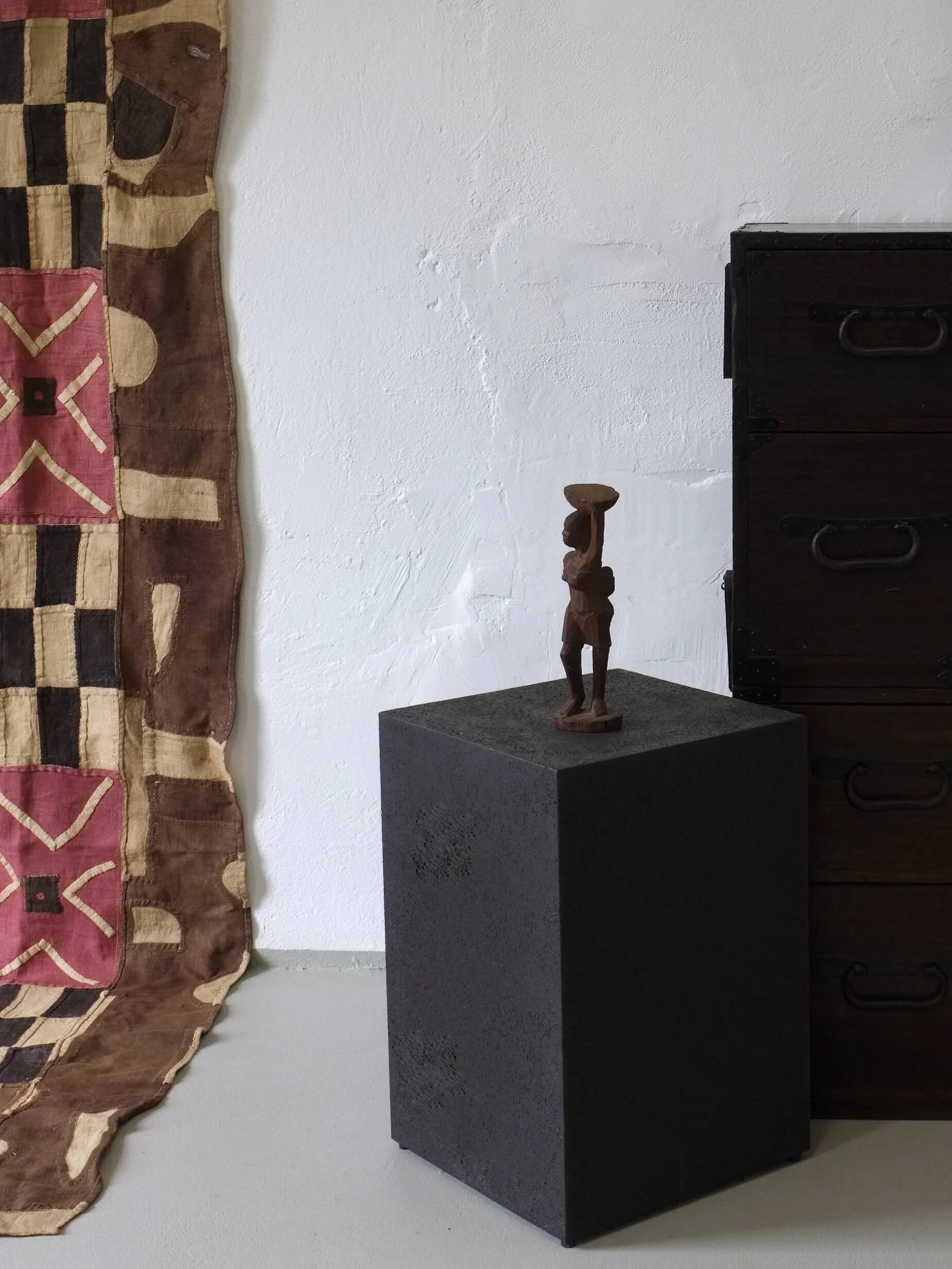 Mid-century hand-carved African woman sculpture