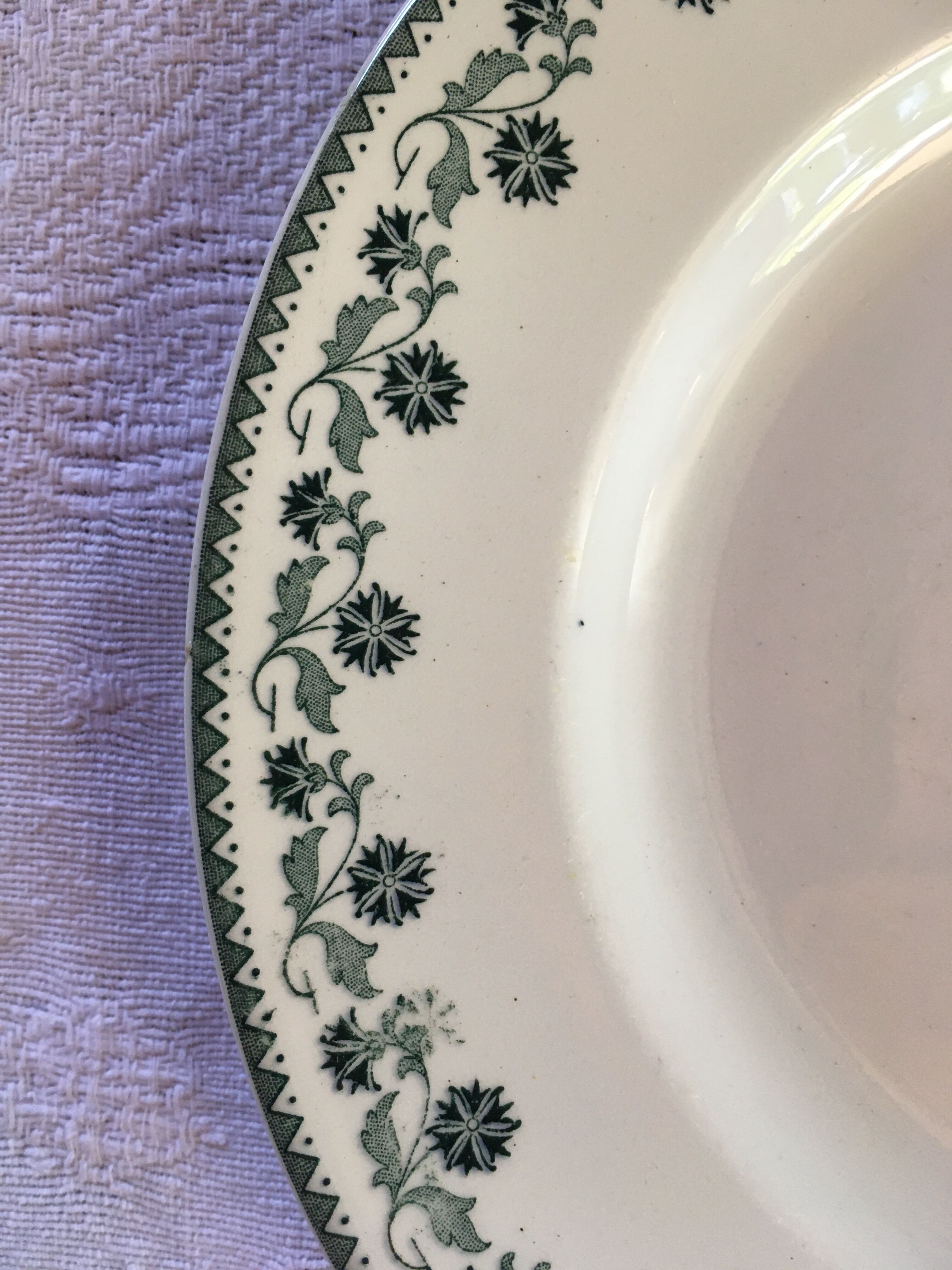 Set of 4 old plates with blue-green décor