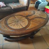 Ceramic and wood table in the shape of trees in the style of capron style