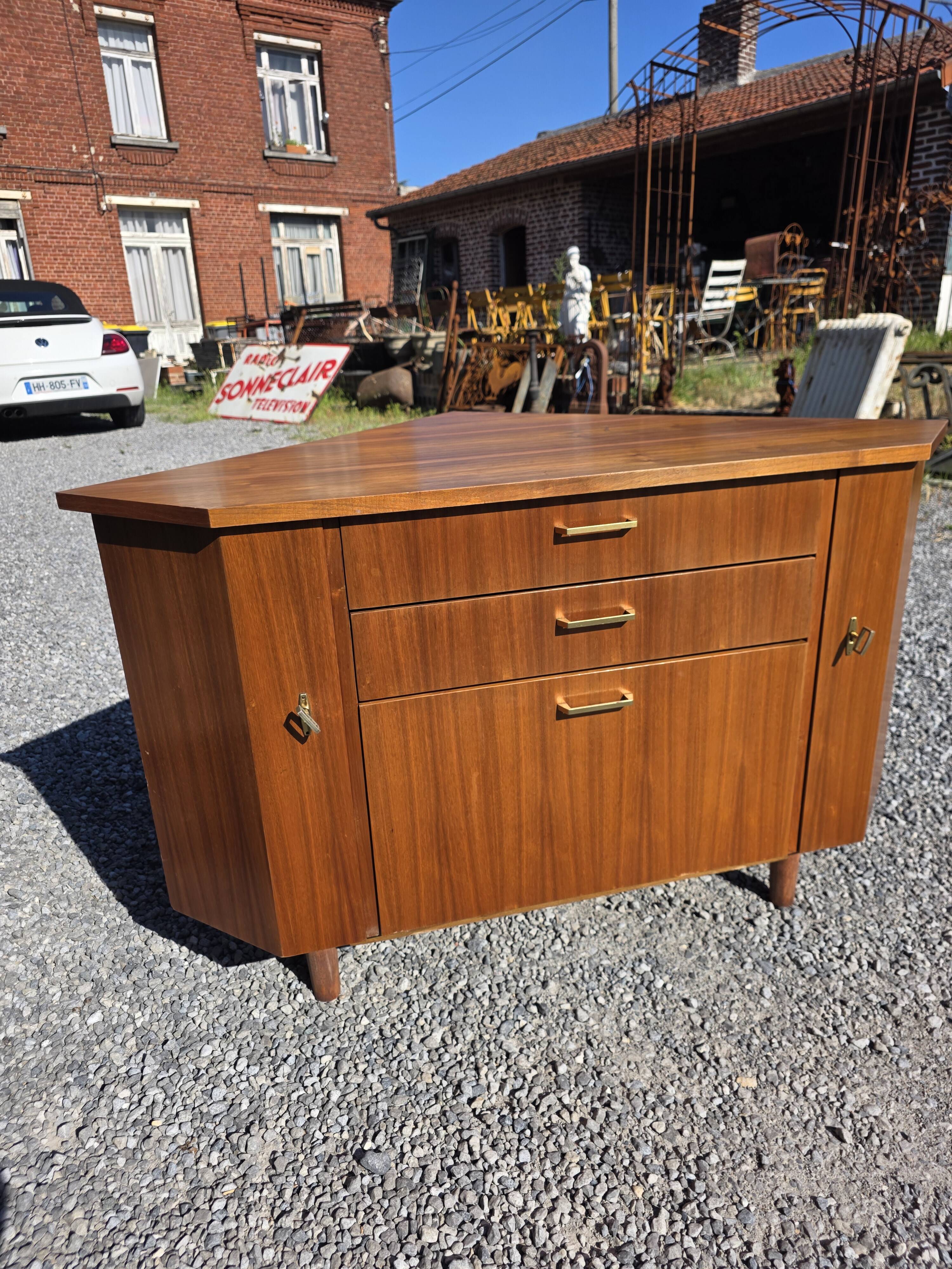 Scandinavian corner unit in teak from the 1960s.