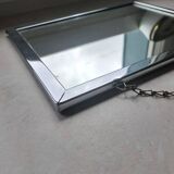 Barber mirror with chain.