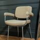 vintage tubular metal chrome office chair with patterned fabric.