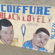 Ancienne enseigne de coiffeur africain