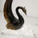 Pair of ancient zoomorphic bookends, swan statues