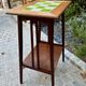 Art Nouveau side table 1910 with double tops in dark oak.