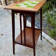 Art Nouveau side table 1910 with double tops in dark oak.