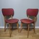 Two vintage chairs wood and mottled red vinyl