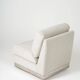 Beige fireside chair by Jacques Charpentier