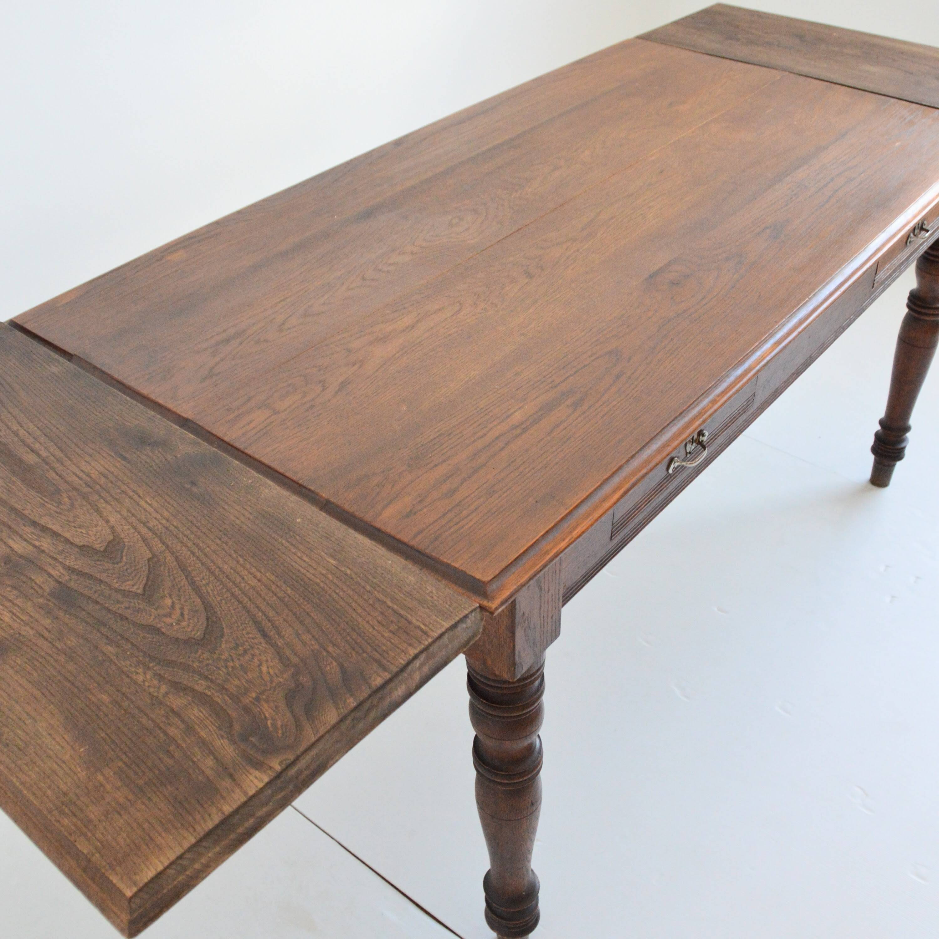 Farm table with extensions from the early 20th century.