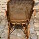 Rocking-chair vintage en rotin canné