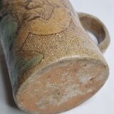Handcrafted glazed stoneware pitcher decorated by hand