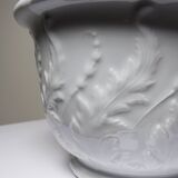 Antique cache-pot in Limoges porcelain with a relief decoration of foliage.