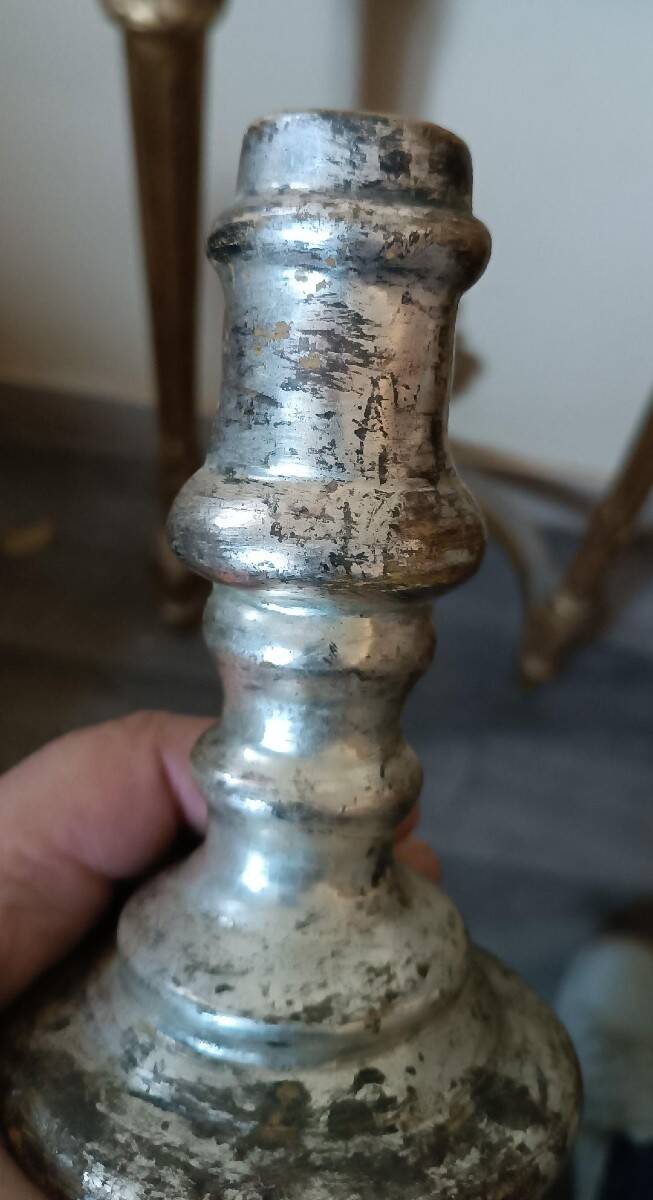Rare pair of antique silvered terracotta candlesticks from the 17th century.