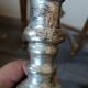 Rare pair of antique silvered terracotta candlesticks from the 17th century.