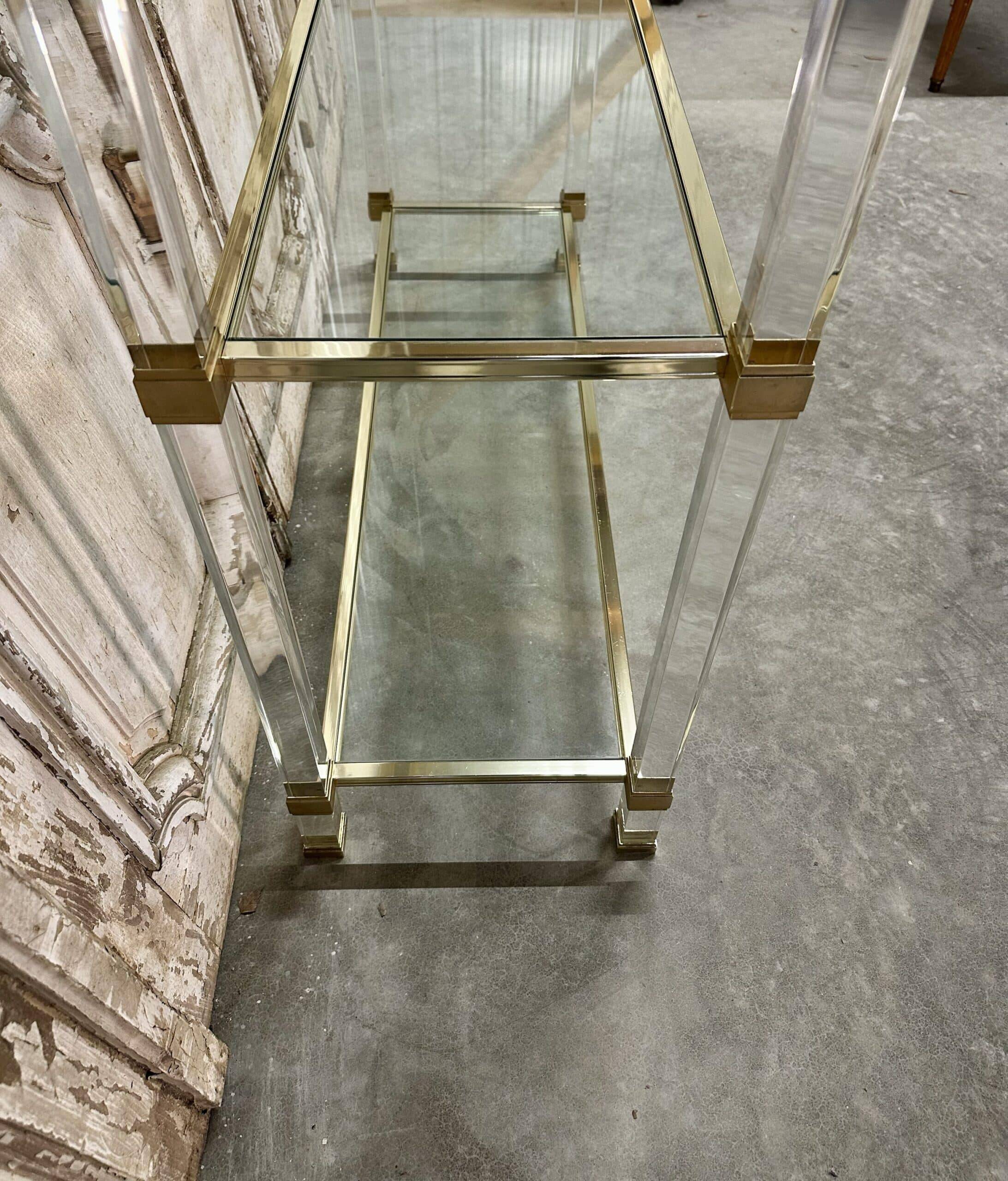 Plexiglass shelf by Pierre Vandel in Hollywood Regency style circa 1970.
