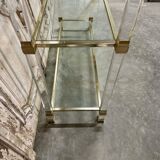 Plexiglass shelf by Pierre Vandel in Hollywood Regency style circa 1970.