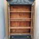 Bookcase black patina shell pediment 2 drawer doors