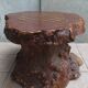 Brutalist chessboard coffee table made from tree stump.